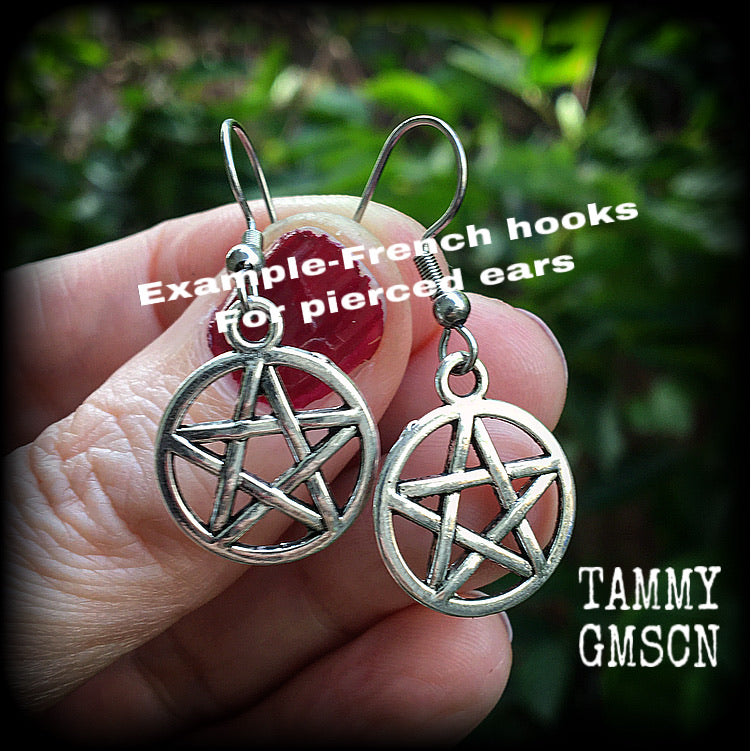 These antique silver pentagram earrings are light weight, weighing only a gram or two each and nice and dangly, measuring just over 4cms from tip to tip.
This pair has been made on stainless steel french hooks, suitable for pierced ears.