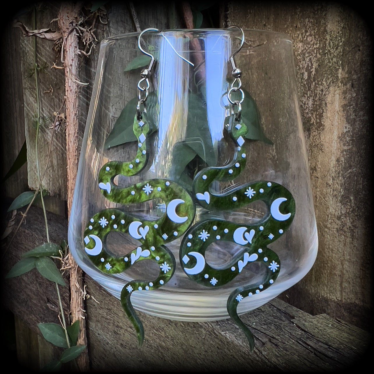 Celestial snake earrings Whimsigoth earrings Serpent earrings Asp earrings Snake jewelry Tunnels Plugs Body jewelry Pierced ears Clip ons Green snake earrings Sun and moon earrings Esoteric snake earrings Ear gauges