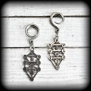 Our 'Tree of Life' gauged earrings feature stunning Kabalistic Tree of Life charms complete with sephiroth symbols. These earrings and are nice and dangly at just on 7cms, and weigh 8 grams a piece.
This pair has been made on 6 gauge (4mm) surgical steel full curl hooks, to be worn in stretched lobes.