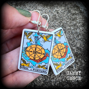 These earrings feature a lightweight acrylic 'Wheel of Fortune' tarot card charm, measuring just on 5cms from tip to tip, weighing only a gram or two each.

This pair has been made with antique silver leverback hooks, suitable for pierced ears or stretched lobes.