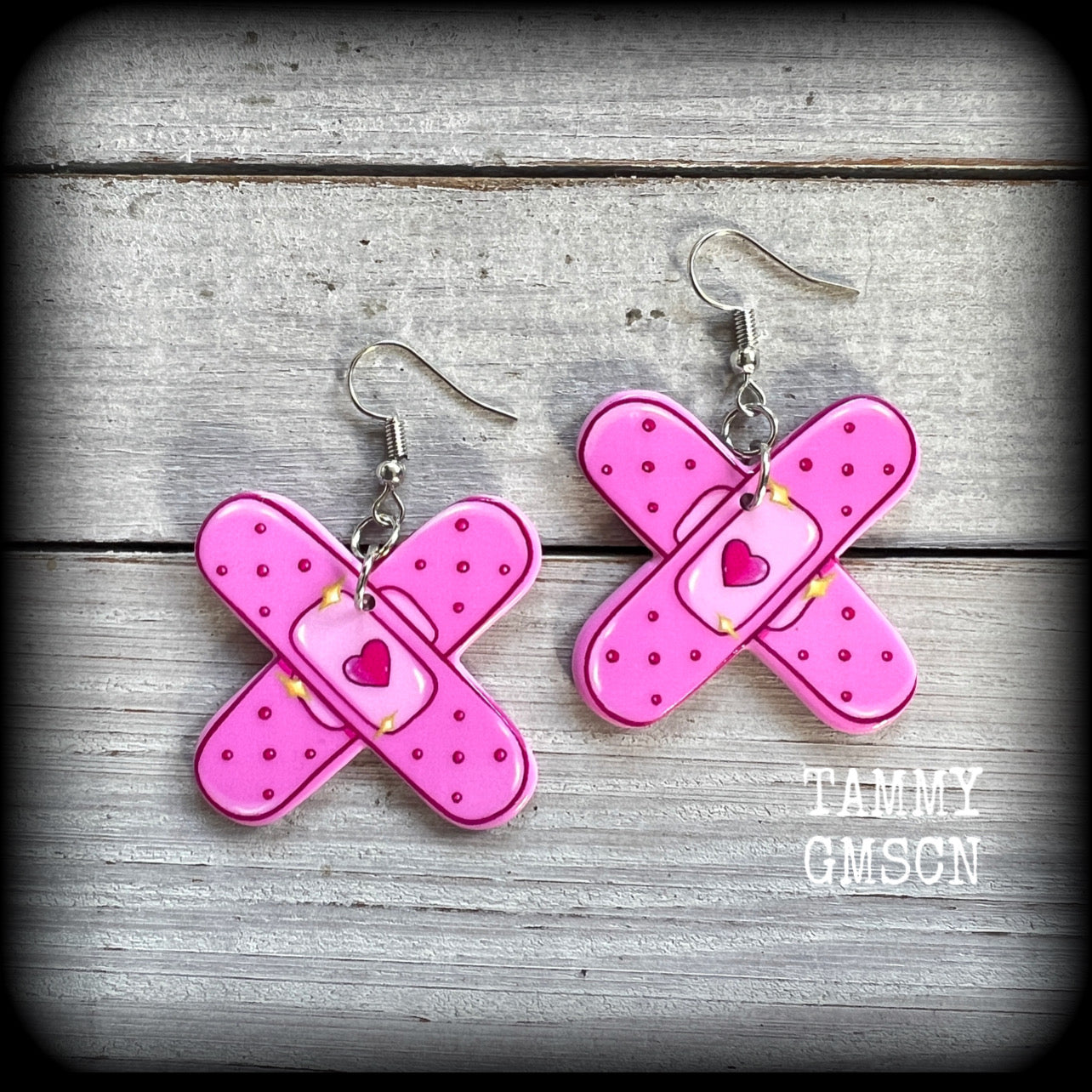 Pink plaster heart earrings