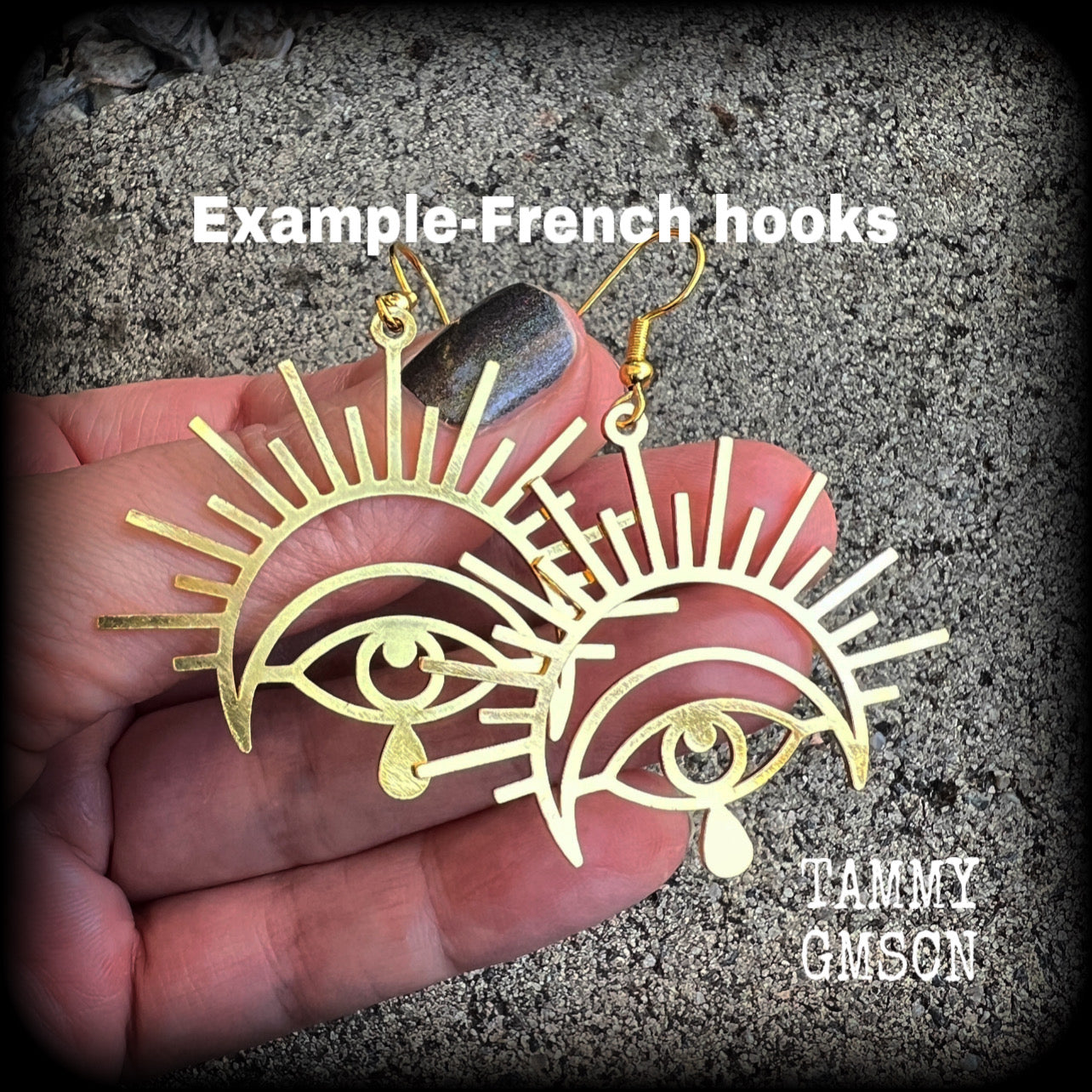 These gorgeous All seeing eye earrings have been made with titanium coated stainless steel charms, measure just on 6cms from tip to tip, and weigh only a gram or two each.

These earrings have been made on antique gold french hooks, suitable for pieced ears.