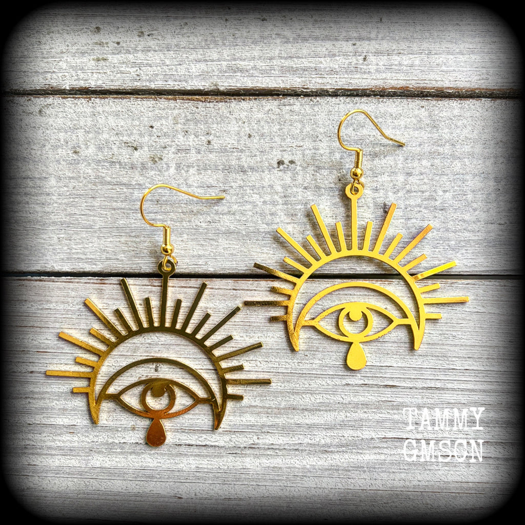 These gorgeous All seeing eye earrings have been made with titanium coated stainless steel charms, measure just on 6cms from tip to tip, and weigh only a gram or two each.

These earrings have been made on antique gold french hooks, suitable for pieced ears.