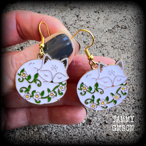 White fox and flowers earrings