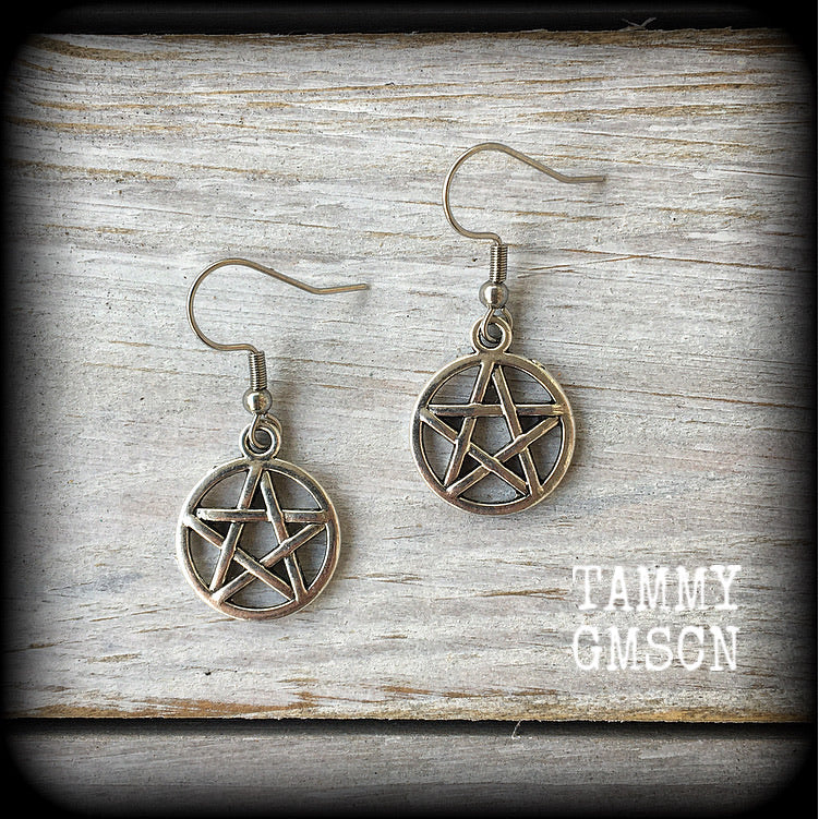 These antique silver pentagram earrings are light weight, weighing only a gram or two each and nice and dangly, measuring just over 4cms from tip to tip.
This pair has been made on stainless steel french hooks, suitable for pierced ears.