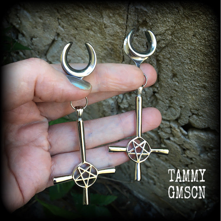 Inverted cross ear weights These gorgeous gothic earrings feature antique silver inverted cross and pentagrams, are nice and dangly, measuring just on 9 cms from tip to tip and weigh approx 15 grams each.

This pair have been made on 5/8" gauge (16mm) surgical steel cradles, suitable for stretched lobes.
