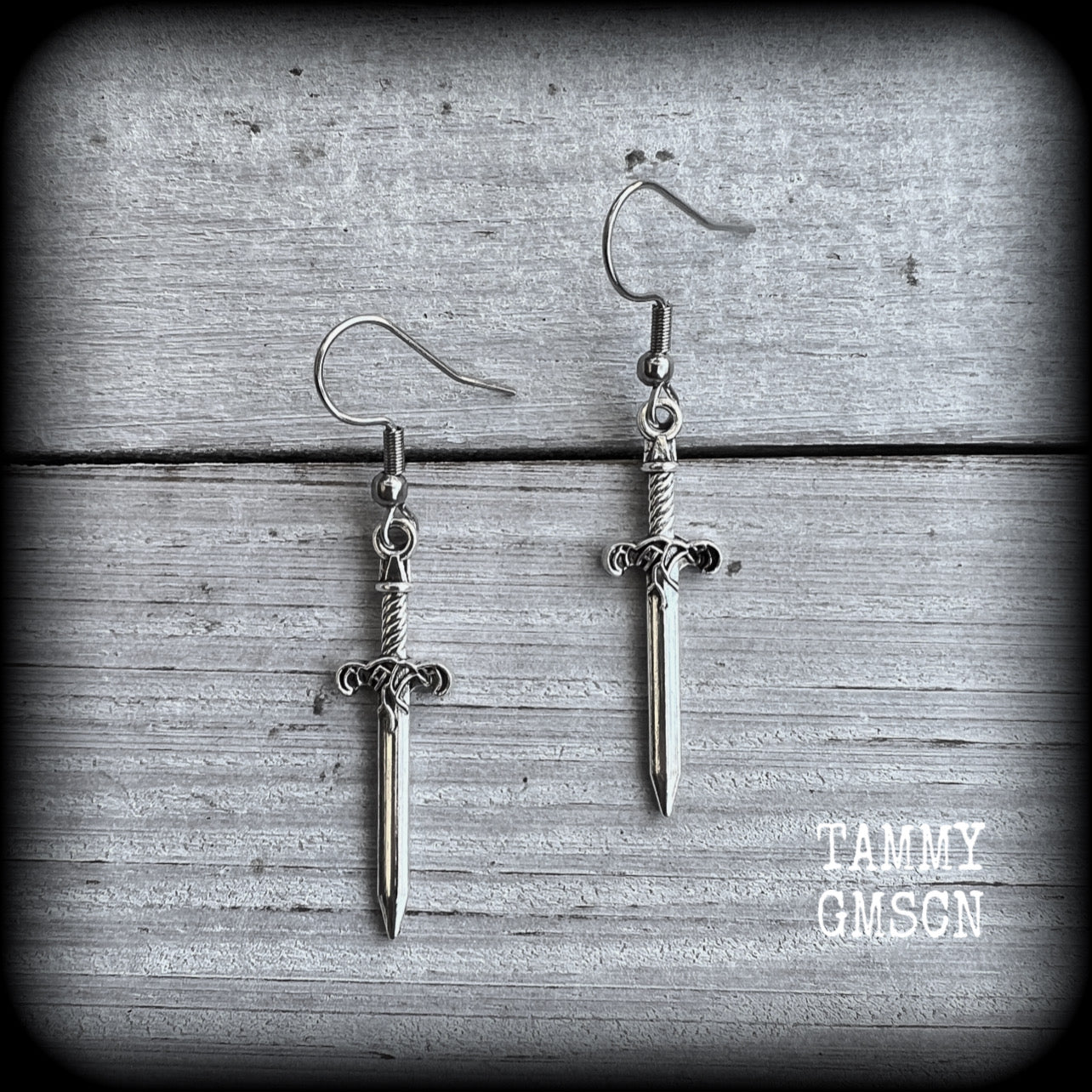 These awesome antique silver sword earrings are super light weight, weighing only a few grams each, and measure just under 4cms from tip to tip.
This pair has been made on stainless steel french hooks, suitable for pierced ears.