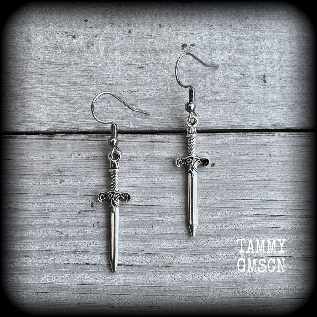 These awesome antique silver sword earrings are super light weight, weighing only a few grams each, and measure just under 4cms from tip to tip.
This pair has been made on stainless steel french hooks, suitable for pierced ears.