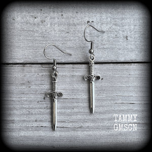 These awesome antique silver sword earrings are super light weight, weighing only a few grams each, and measure just under 4cms from tip to tip.
This pair has been made on stainless steel french hooks, suitable for pierced ears.