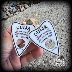 These classic black and white planchette earrings are lovely and light weight at only a few grams a piece and measure just under 7cms from tip to tip. 
Made from acrylic, these earrings are a nice size without all the weight.

This pair has been made with antique gold french hooks, suitable for pierced ears.