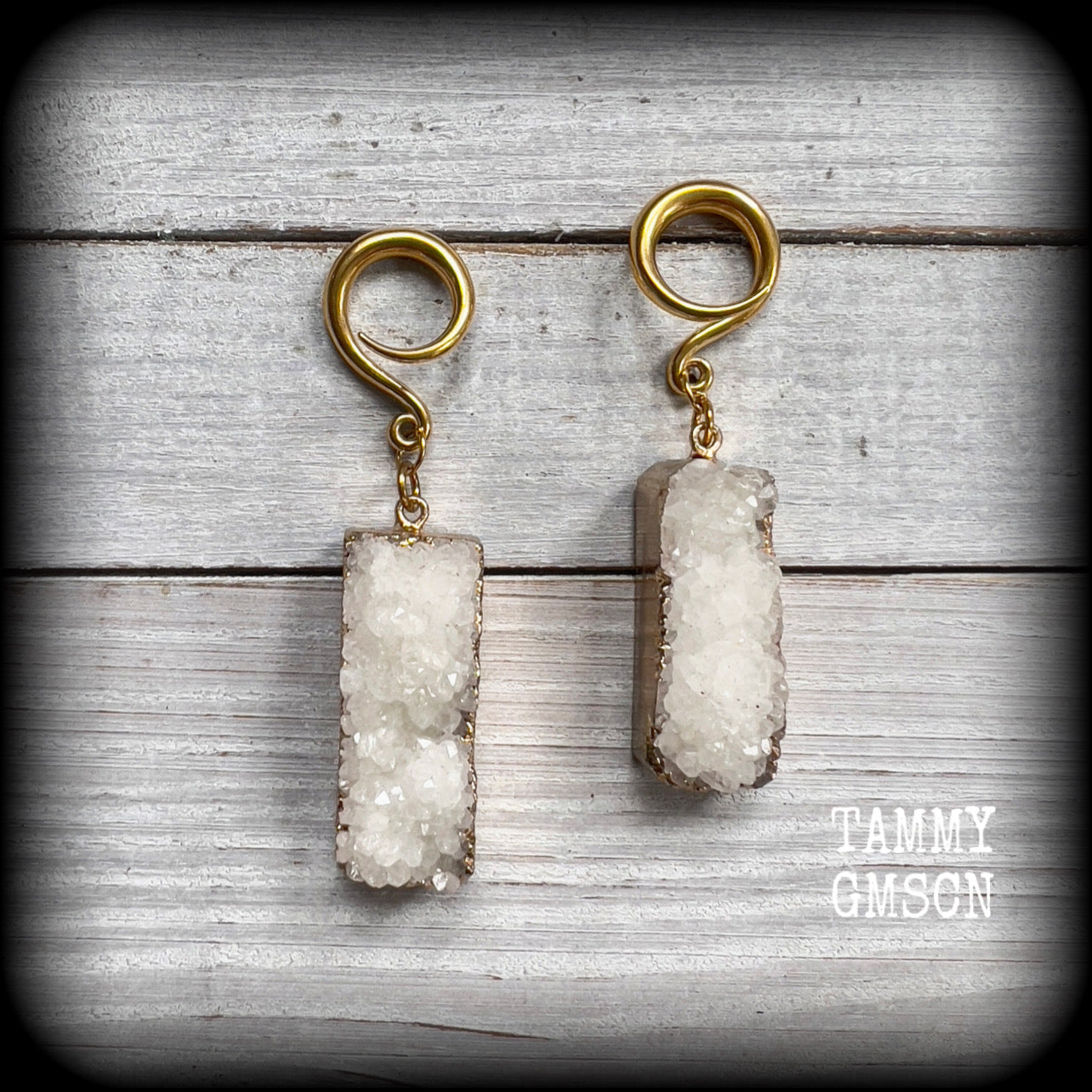 Measuring just 7.5 cms from tip to tip, and weighing approx 13 grams each, these gorgeous rustic white druzy and antique gold earrings have been made on 6 gauge (4mm) titanium coated surgical steel full curl hooks, to be worn in stretched lobes.