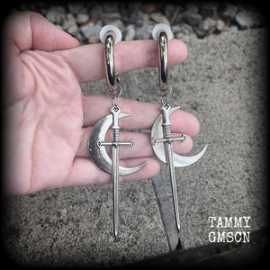 Sword and crescent moon gauged hoop earrings