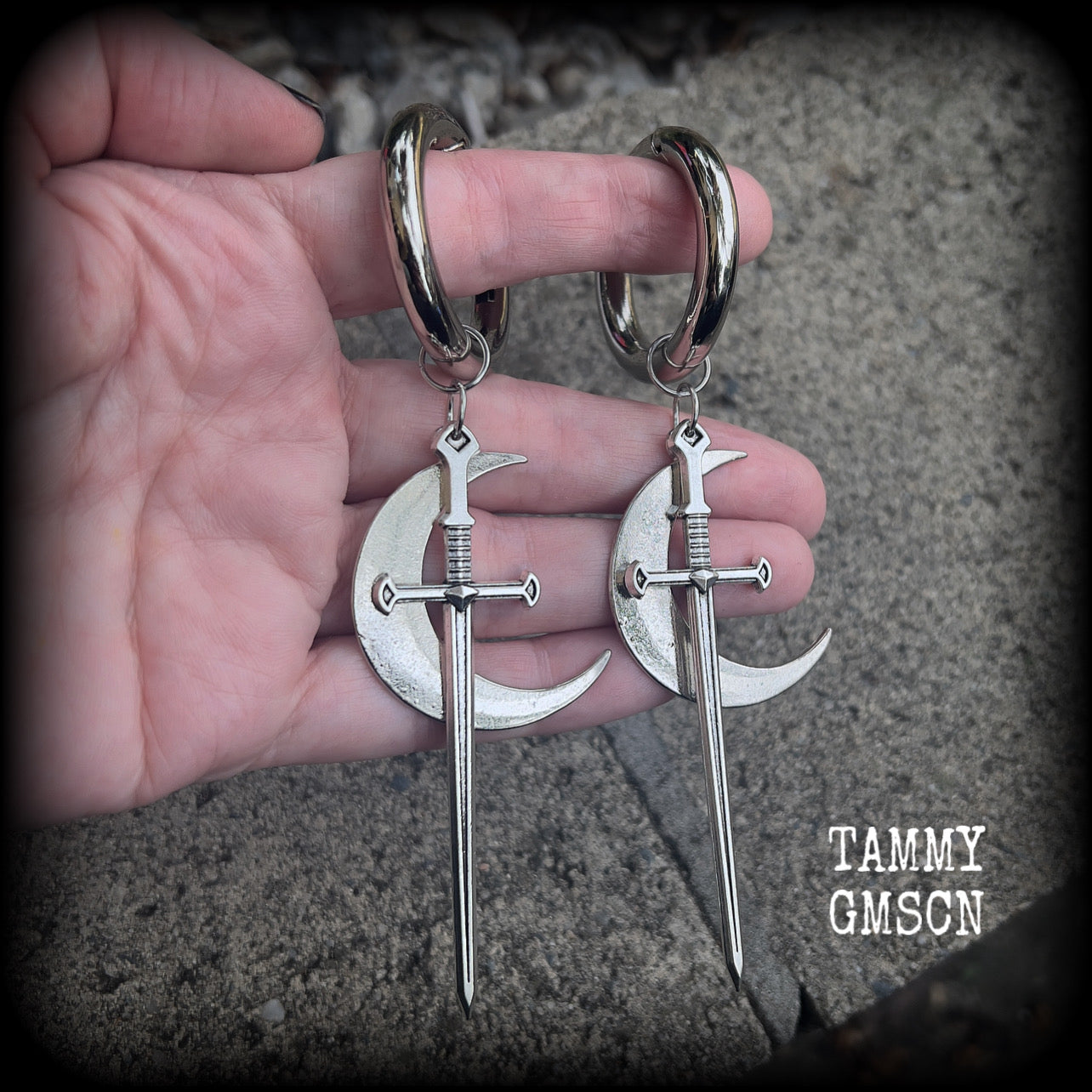Sword and crescent moon gauged hoop earrings