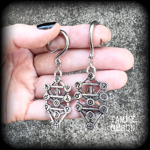 Our 'Tree of Life' gauged earrings feature stunning Kabalistic Tree of Life charms complete with sephiroth symbols. These earrings and are nice and dangly at just on 7cms, and weigh 8 grams a piece.
This pair has been made on 6 gauge (4mm) surgical steel full curl hooks, to be worn in stretched lobes.