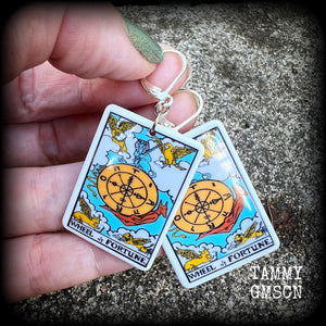 These earrings feature a lightweight acrylic 'Wheel of Fortune' tarot card charm, measuring just on 5cms from tip to tip, weighing only a gram or two each.

This pair has been made with antique silver leverback hooks, suitable for pierced ears or stretched lobes.
