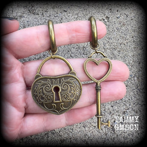 Antique bronze padlock and key hoop earrings-Tunnel hoops