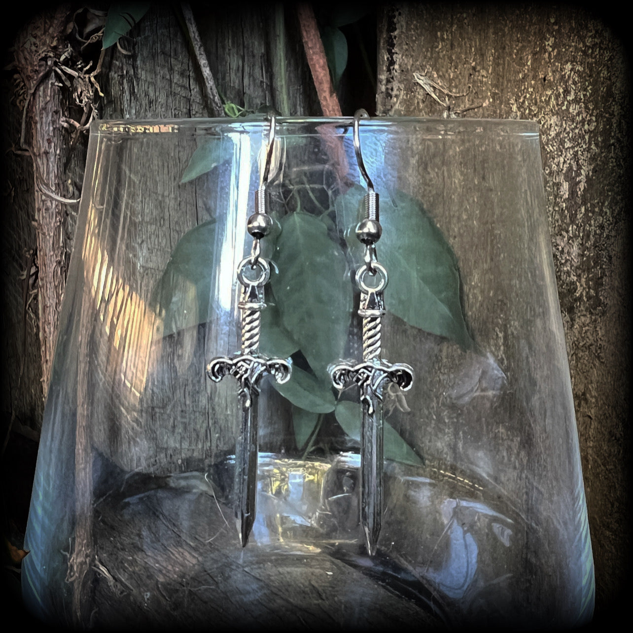 These awesome antique silver sword earrings are super light weight, weighing only a few grams each, and measure just under 4cms from tip to tip.
This pair has been made on stainless steel french hooks, suitable for pierced ears.