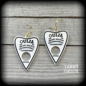 These classic black and white planchette earrings are lovely and light weight at only a few grams a piece and measure just under 7cms from tip to tip. 
Made from acrylic, these earrings are a nice size without all the weight.

This pair has been made with antique gold french hooks, suitable for pierced ears.