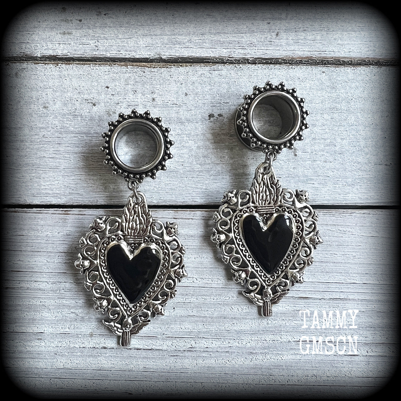 Black sacred heart tunnel earrings with cherbus and filigree details available on a range of different style tunnels from 6mm to 25mm