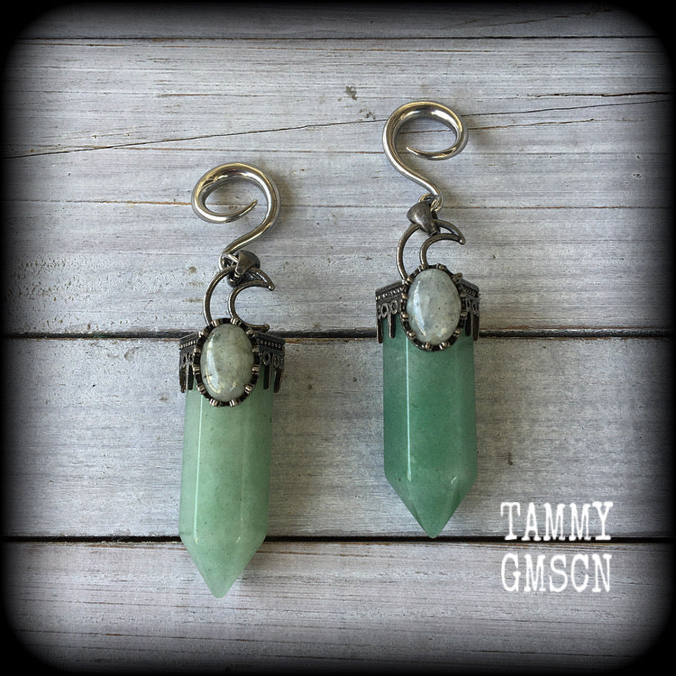 These gorgeous gemstone gauged earrings have been made with beautiful chunky seafoam aventurine and labradorite gemstone points, measuring just under 10 cms from tip to tip, and weighing approx 31 grams each.
These earrings have been made on 6 gauge (4mm) surgical steel full curl hooks, suitable for stretched lobes.