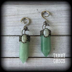 These gorgeous gemstone gauged earrings have been made with beautiful chunky seafoam aventurine and labradorite gemstone points, measuring just under 10 cms from tip to tip, and weighing approx 31 grams each.
These earrings have been made on 6 gauge (4mm) surgical steel full curl hooks, suitable for stretched lobes.