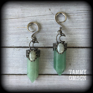 These gorgeous gemstone gauged earrings have been made with beautiful chunky seafoam aventurine and labradorite gemstone points, measuring just under 10 cms from tip to tip, and weighing approx 31 grams each.
These earrings have been made on 6 gauge (4mm) surgical steel full curl hooks, suitable for stretched lobes.