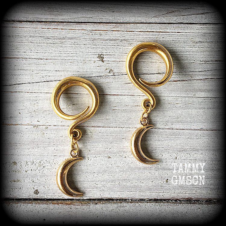 These gorgeous antique gold crescent moon ear hangers and are lovely and dangly, weighing approx 5 grams each, and measuring around 5 cms from tip to tip.

This pair has been made on 6 gauge (4mm) surgical steel full curl hooks, suitable for stretched lobes.