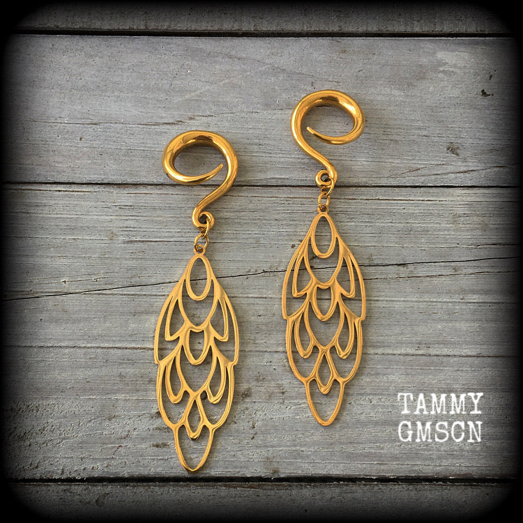 These gorgeous gauged earrings are inspired by Aphrodite, Goddess of love and beauty. Nice and light weight, these earrings weigh approx 6 grams a piece, and measure just over 8cms from tip to tip.

This pair has been made on 6 gauge (4mm) surgical steel full curl hooks, to be worn in stretched lobes.