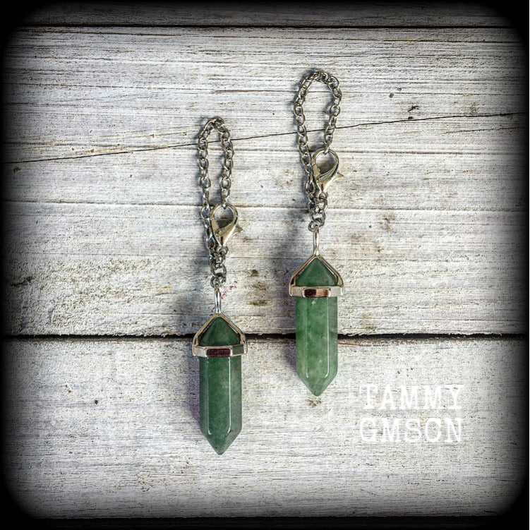 These earrings feature gorgeous green aventurine pendulums, nice and light weight and nice and dangly, measuring just on 7 cms and weighing just 5 grams each.


This pair have been made with our super versatile chain and lobster clasp 4mm option, to be worn through silicone earlets and metal tunnels from 6 gauge (4mm).