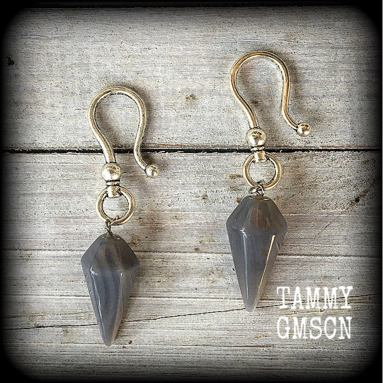 These earrings feature gorgeous grey agate pendulums, are nice and dangly measuring just over 7cms, and are nice and light weight, weighing approx 5 grams each.
This pair have been made with large antique shephard hooks, suitable for stretched lobes when worn through silicone earlets from 2 gauge (6mm). 