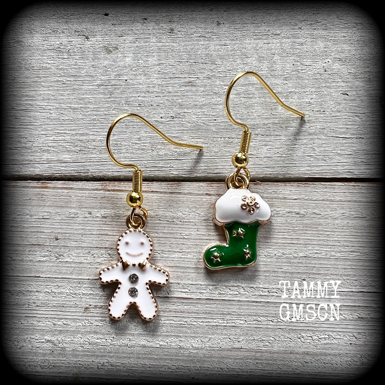 These adorable earrings feature cute little frosted gingerbread man with santa stocking, measuring just on 3.5cms and weighing only a few grams each.

This pair has been made on antique gold french hooks, for pierced ears.