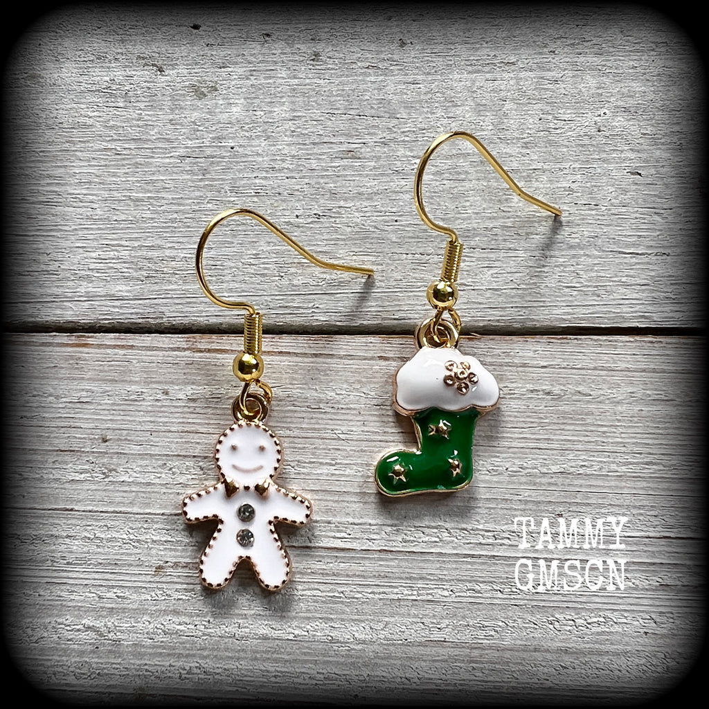 These adorable earrings feature cute little frosted gingerbread man with santa stocking, measuring just on 3.5cms and weighing only a few grams each.

This pair has been made on antique gold french hooks, for pierced ears.