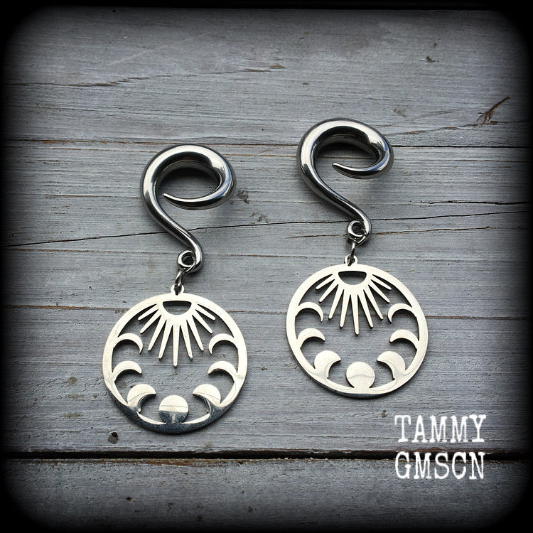 These gorgeous earrings feature stainless steel moon phase and sunray charms, measuring just under 7cms from tip to tip, and weighing only 8 grams each, not too heavy.

This pair have been made on 2 gauge (6mm) surgical steel full curl hooks, suitable for stretched lobes.