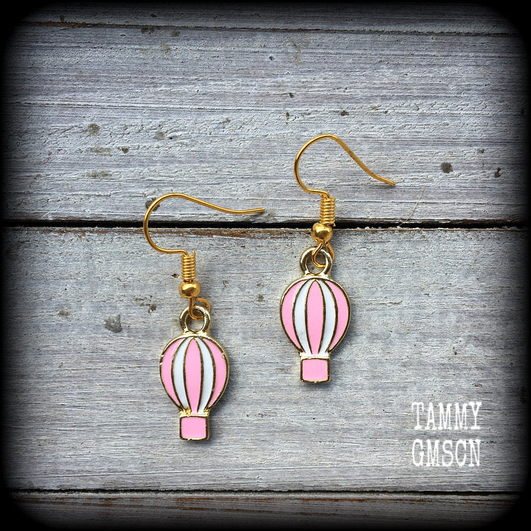 This pair of super cute earrings features antique gold and pink and white enamel hot air balloons, measuring just on 4cms from tip to tip, weighing only a gram or two each.

This pair have been made with antique gold french hooks, for pierced ears.