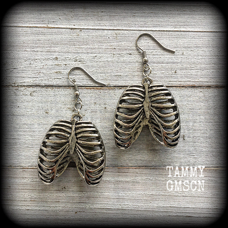 These awesome antique silver ribcage earrings measure in at just over 6cms from tip to tip, just on 3cms wide, and weigh in at approx 11 grams each.

This pair has been made with stainless steel french hooks to be worn through pierced ears.