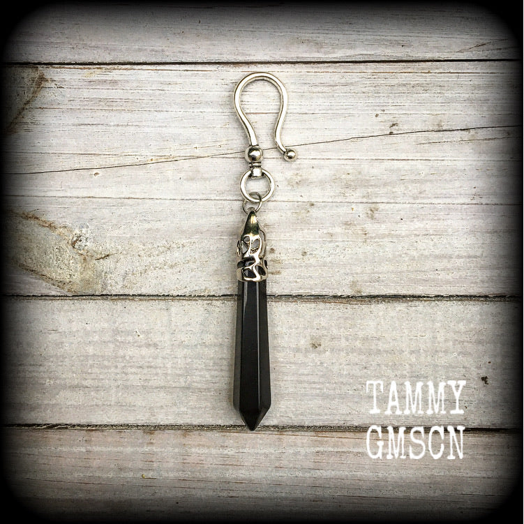 This listing is for a SINGLE pitch black, black obsidian earring, measuring just under 11cms from tip to tip and weighing in at 16 grams a piece.

This earring has been made with a large antique silver shephards hook to be worn through silicone earlets from 2 gauge (6mm).