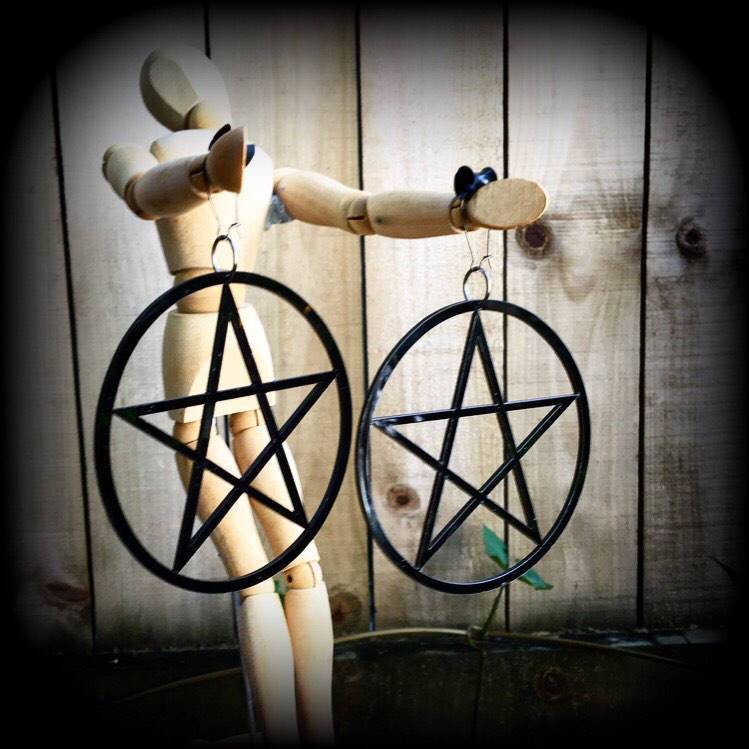 Oversized pentagram earrings