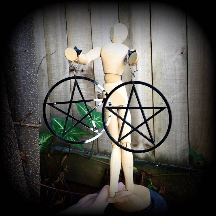 Oversized pentagram earrings