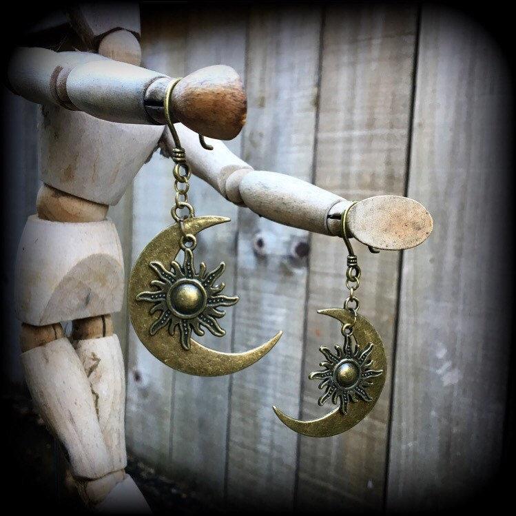 Esoteric sun and moon earrings-Ear hangers