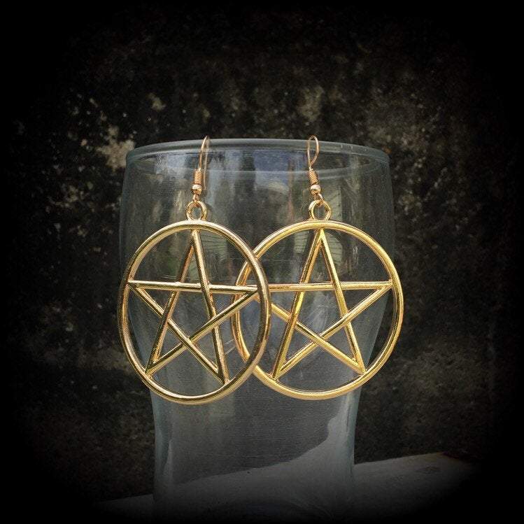 These are beautiful earrings feature large champagne gold pentagrams ,light weight (weighing only a few grams each) and nice and dangly, measuring just on 8cms from tip to tip.

This pair has been made on antique gold french hooks, suitable for pierced ears.