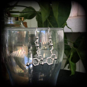 These cute little antique silver Serotonin molecule earrings measure just under 5cms from tip to tip, and are super light weight at only a few grams each.

This pair have been made with stainless steel french hooks, to be worn in pierced ears.