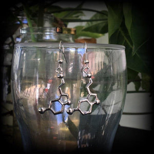 These cute little antique silver Serotonin molecule earrings measure just under 5cms from tip to tip, and are super light weight at only a few grams each.

This pair have been made with stainless steel french hooks, to be worn in pierced ears.