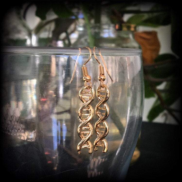 These adorable antique gold DNA helix earrings measure just under 6cms from tip to tip, and weigh only a few grams each.

This pair have been made with antique gold french hooks, suitable for pierced ears. 