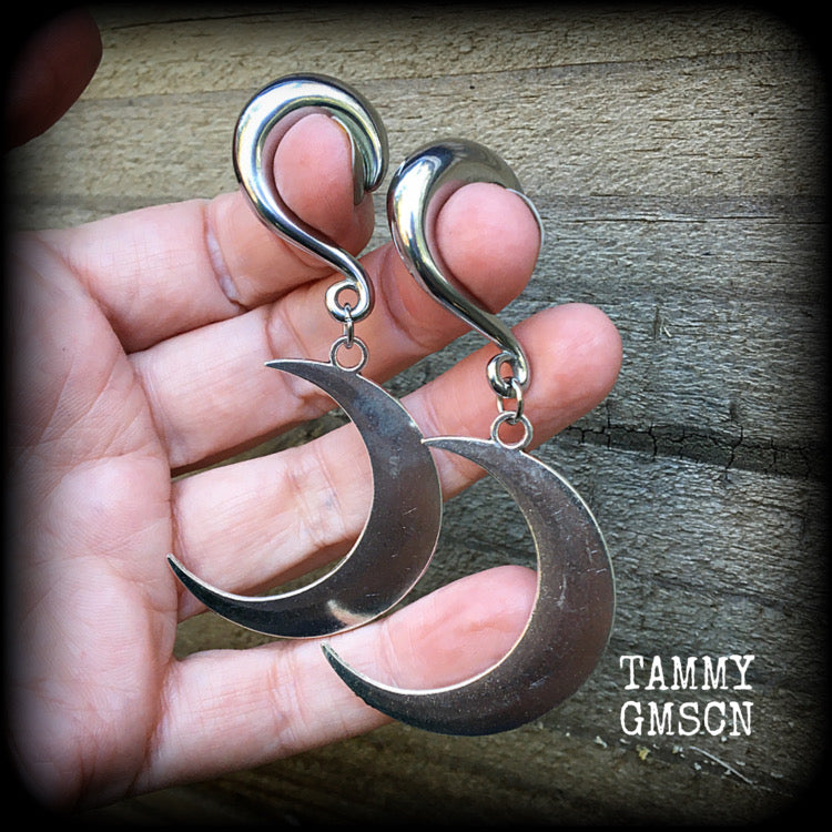 These gorgeously witchy antique silver 'Crescent moon' gauged earrings feature a classic antique silver crescent moon, measuring just under 8cms from tip to tip, and weighing approx 15 grams each.

This pair has been made on 0 gauge (8mm) surgical steel half curl hooks, to be worn in stretched lobes.
