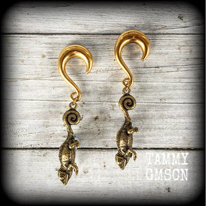 These earrings are brass chameleon lizards hanging by their tail, pictured here with our half curl hooks. Choose from 4 different style hooks for lobes stretched up to 30mm.