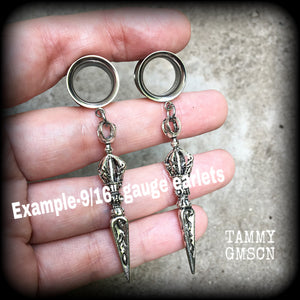 Vajra dagger tunnel earrings