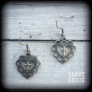 This pair of earrings features an ornate sacred heart with christian cross, nice and lightweight at just 2 grams a piece, and not too dangly, measuring just on 4cms from tip to tip.
This pair has been made with stainless steel french hooks, for pierced ears.
