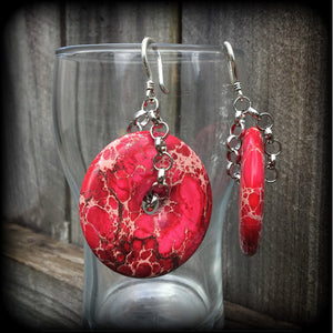 These gorgeous deep pink Ocean jasper earrings weigh in at 32 grams a piece, and hang just on 9cms from tip to tip, made with small antique silver shephard hooks, to be worn in silicone earlets in stretched lobes from 8 gauge (3mm).