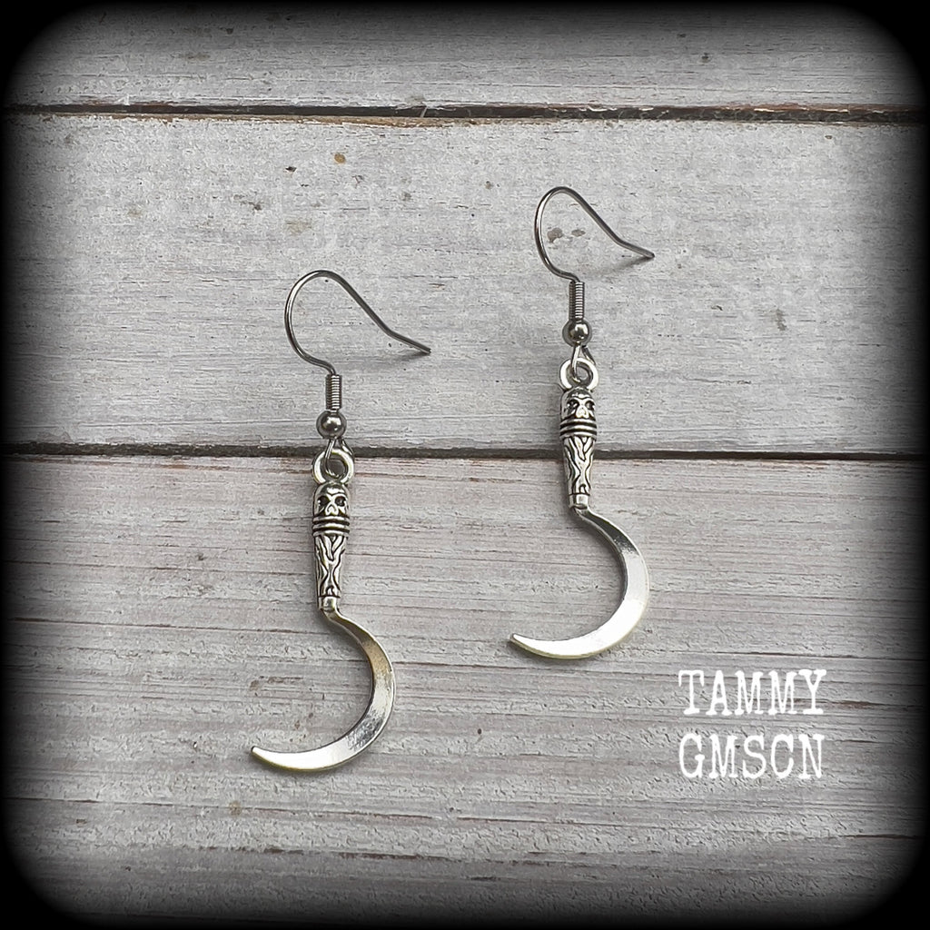 Featuring super cute super lightweight antique silver grim reaper scythes, these earrings are lovely and petite, measuring just under 5cms from tip to tip and weigh only a gram or two each.

This pair has been made with stainless steel french hooks, for pierced ears.