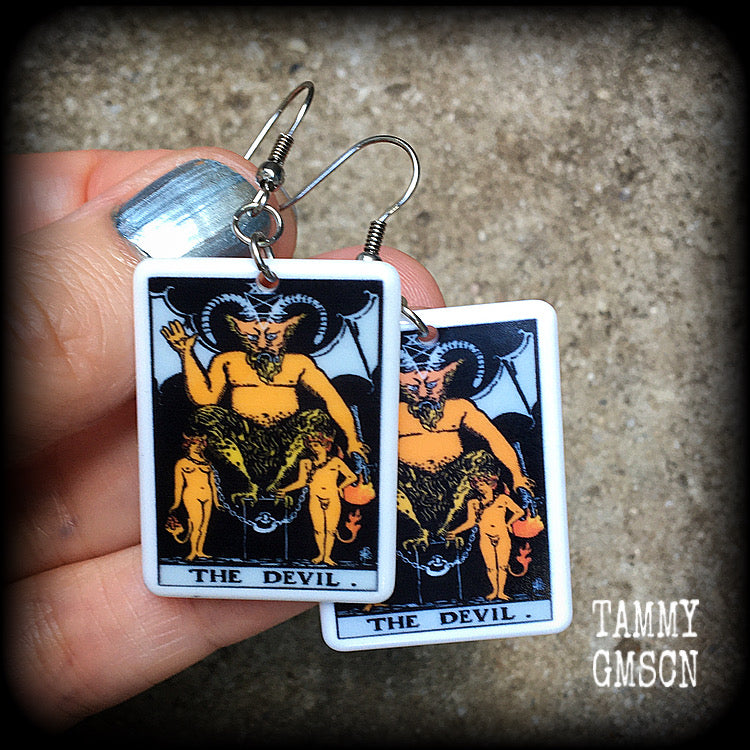 These earrings feature a lightweight Rider Waite ‘The Devil’ tarot card charm, measuring just over 6cms from tip to tip and weighing only a few grams each.

This pair has been made with stainless steel french hooks, for pierced ears.